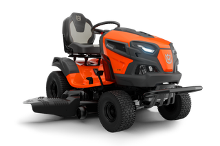 Front view of a ride-on lawn mower with visible seat and steering wheel.