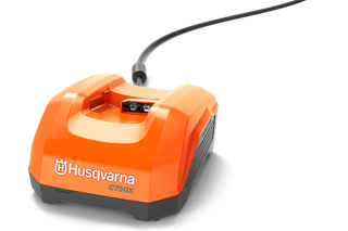Front view of a Husqvarna C750X battery charger with a power cord.