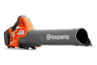Side view of a Husqvarna leaf blower showcasing its ergonomic design.