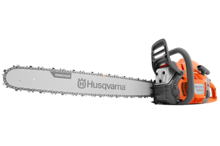 Side view of a Husqvarna chainsaw with a visible blade and handle.