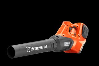 Side view of a Husqvarna leaf blower showcasing its ergonomic design.