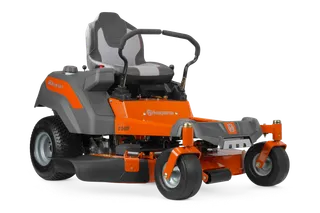 Side view of a Husqvarna zero-turn ride-on mower with visible cutting deck.