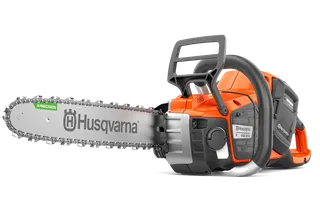 Side view of a Husqvarna chainsaw with visible battery compartment and chain.