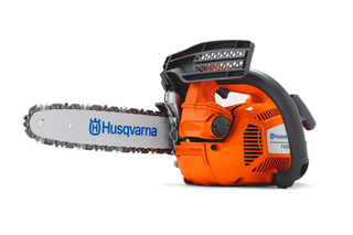 Side view of a Husqvarna chainsaw with visible branding.