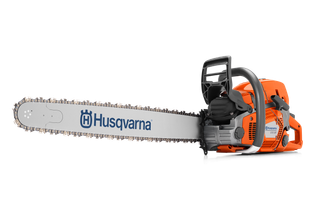 Side view of a Husqvarna chainsaw with visible branding on the blade.