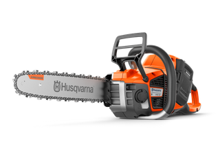 Side view of a Husqvarna chainsaw with visible branding on the blade.