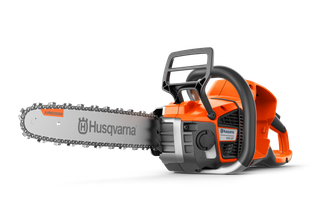 Side view of a Husqvarna chainsaw with ergonomic handle and visible branding.