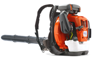 Side view of a Husqvarna backpack leaf blower, showcasing its engine and blower tube.