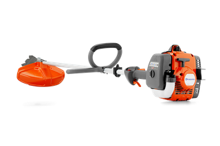 Side view of a Husqvarna brushcutter with ergonomic handle and control panel.