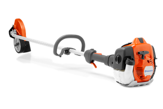 Side view of a Husqvarna brush cutter with ergonomic handle and cutting blade.