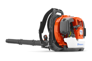 Side view of a Husqvarna backpack leaf blower with visible controls and straps.