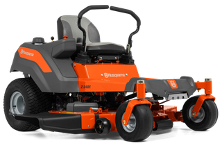 Side view of a Husqvarna zero-turn mower with dual steering levers.