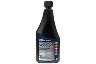 Front view of a Husqvarna fuel treatment bottle with label details.