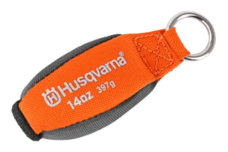 Top view of a Husqvarna keychain with branding and weight specification.