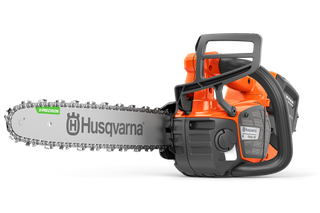 Side view of a Husqvarna chainsaw showcasing its ergonomic handle and battery compartment.
