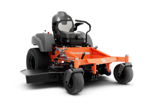 Front view of a Husqvarna zero-turn ride-on mower with a cutting deck.