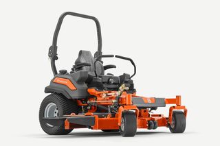 Front view of a Husqvarna zero-turn mower with ergonomic seat and control levers.