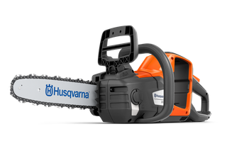 Side view of a Husqvarna chainsaw with ergonomic handle and visible branding.