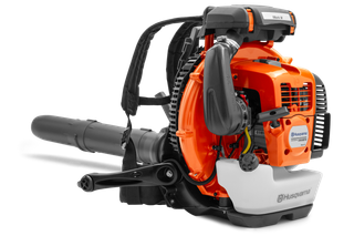 Side view of a Husqvarna backpack leaf blower showcasing its engine and harness.