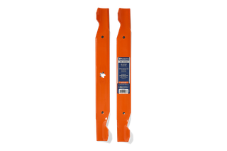 Two Husqvarna lawn mower blades displayed side by side in a studio setting.