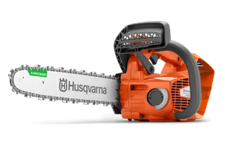 Side view of a Husqvarna chainsaw with visible branding and ergonomic handle.