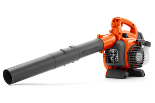 Side view of a Husqvarna leaf blower with ergonomic handle and visible fuel tank.