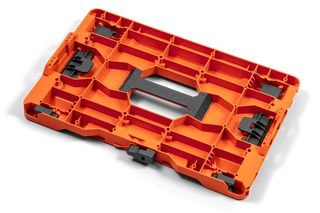 Top view of a Husqvarna tool organizer tray with slots and handle.