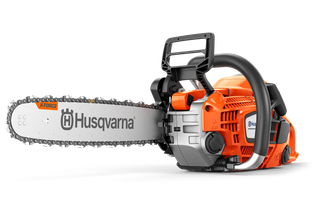 Side view of a Husqvarna chainsaw with ergonomic handle and visible branding.