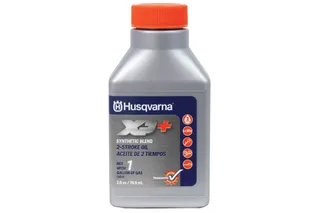 Front view of a Husqvarna synthetic blend 2-stroke oil bottle with product details visible.