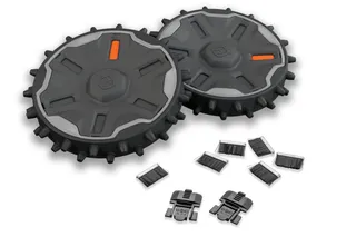 Top view of Husqvarna robotic lawn mower wheels and accessories, including brushes and clips.