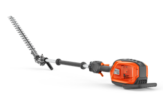 Side view of a Husqvarna battery-powered hedge trimmer with an extended pole.