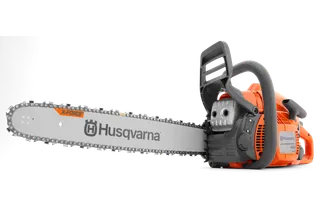 Side view of a Husqvarna chainsaw with X-Force bar and chain.