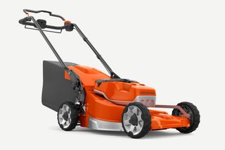 Side view of a Husqvarna battery-powered lawn mower.