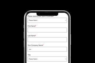 Mobile phone displaying a business registration form with fields for type of business, first name, last name, company name, and title.