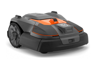 Side view of a Husqvarna robotic lawn mower designed for efficient garden maintenance.
