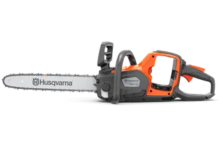 Side view of a Husqvarna chainsaw showcasing its ergonomic handle and design.