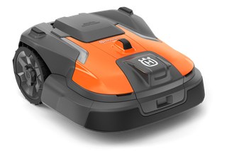 Front view of a robotic lawn mower designed for efficient garden maintenance.