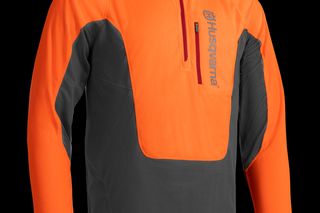 Front view of a Husqvarna work shirt with a zippered chest pocket.